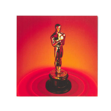 An orange sticker with a 96th Academy Awards Oscar statuette on a red and orange background.